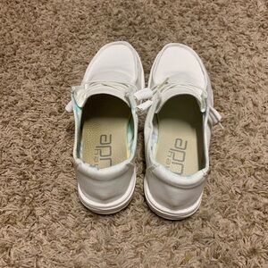 White womens Hey Dude loafers